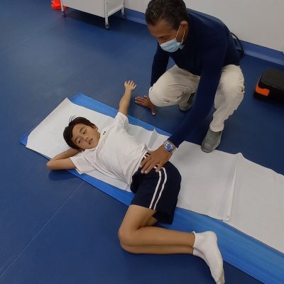 Dr Jeff performing a lying down technique in our Gym.